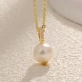 Elegant 18K gold plated necklace featuring a round white pearl with crystal inlay - Round Pearl Simple Pendant (A0142)