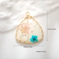 Detailed view of handmade resin flower pendant with dimensions 34.7mm by 28.2mm - Pink Resin Triangle Dried Flower Style