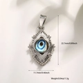 Pendentif œil turc avec œil en résine bleue et zircons sur monture argentée - Gravure Radiante Platine