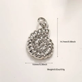 Detailed view of silver spiral fish pendant with measurements 14.7mm by 9.6mm - Silver Sea Snail