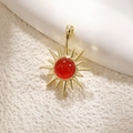 Gold plated sun pendant with a polished red gemstone and radiant starburst details - Red Agate Radiant Style (A0716)