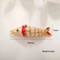 Detail of 18k gold plated fish pendant with red enamel, measuring 39.5mm by 12mm - Gold Cream Enamel (A0122)