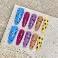 Set de uñas postizas con estampado de leopardo en azul, rosa, violeta y amarillo brillante - Extra Pequeño (XS) / Forma de Almendra Larga