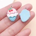 Detailed front and back views of resin cherry ice cream cone pendants for DIY crafts - Lake Blue Pink Cherry Cone Style (24475)
