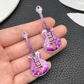 Detail of acrylic guitar charms with purple gradient and geometric diamond texture patterns - Transparent Purple Guitar (24052)