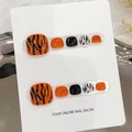 Unghie finte per piedi fatte a mano con motivo a tigre arancione e nero lucido - S
