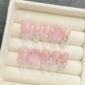 Pink translucent press-on nails with ice-glaze gems and silver chains in a jewelry box - Large (L) / Medium-length Pointed Round