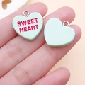 Macro shot of mint green Sweet Heart pendant with silver ring and smooth back side - Green Sweet Heart Style (24506)