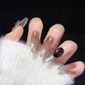 Unghie finte a mandorla cat-eye lunghe con pietre ambra e fiocco argento - XS / Occhio di Gatto Ambra