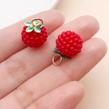 Realistic red resin raspberry charms with textured surface and iridescent leaf detail - Round Strawberry Raspberry (24143)