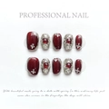 Detail of luxury handmade press-on nails in burgundy with pearls and rubies charms - Extra Small (XS) / Red Buccellati Style (1241)