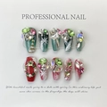 Faux ongles de Noël faits main avec strass vert et rouge et motifs de flocons de neige - Très Petit (XS) / Canard Mandarin Lourd de Noël