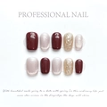 Detailed view of handmade cherry red cat-eye press-on nails with gold foil accents - Extra Small (XS) / Hong Kong Style Beauty (1211)