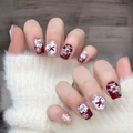 Unghie finte fatte a mano 3D pupazzo di neve e fiocchi bordeaux con catena di perle - XS