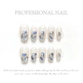 Sparkly dark green cat-eye press-on nails with blue-purple glitter gems and 3D heart charms - Warm Elf Series