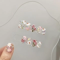 Unghie finte 3D dipinte a mano con fiori e glitter su supporto in acrilico trasparente - Extra Piccolo (XS) / 1500 Tondo Corto