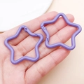 Close-up of two light purple star-shaped carabiners held in palm for size comparison - Purple (FT188)