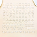 Flat lay of geometric heart and bow faux pearl acrylic nail art and DIY decor pieces - Multiple Shapes Mixed (BE24)