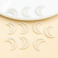 Detailed view of cream white crescent moon faux pearl charms for DIY nail art and phone cases - Hollow Moon (25778) / 15x11mm
