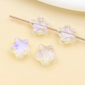 Macro detail of star shaped glass beads with iridescent purple finish for jewelry DIY - Transparent White Premium Iridescent