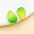 Macro detail of gradient green glass leaf charms with realistic vein texture for DIY jewelry - Transparent Dark Green Yellow (26842)
