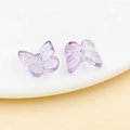 Macro shot of two purple butterfly glass beads with gold foil finish for DIY jewelry - Transparent Light Purple Gold Foil
