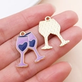 Detail of lavender wine glass charms with blue heart enamel and golden textured back - Purple Heart Goblet (27220)