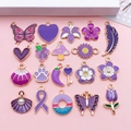 Flat lay of purple enamel alloy charms featuring hearts, feathers, and floral DIY designs - Purple Enamel 20 Styles Set (SN1640)