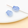 Close-up of translucent light blue glass tulip flower beads for DIY jewelry making - Transparent Blue Tulip (26710)