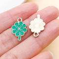 Macro view of green enamel clover charm with gold plating and textured metal back - Dark Green Four Leaf Clover (25095)