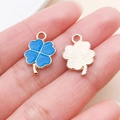 Detail of blue enamel four-leaf clover charm and embossed golden metal back texture - Clover Style (11049)