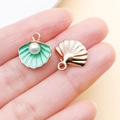 Macro shot of mint green shell charms with white pearls and rose gold finish for DIY jewelry - Pearl Shell Charm (23197)