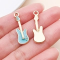 Guitar shaped alloy pendant in light blue enamel and gold finish for DIY jewelry - Musical Instrument Guitar Style (19455)