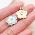 Light blue flower pendant charm with gold metal striped back for DIY bracelets - Five-Petal Cherry Blossom Style (24821)