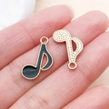 Pendentifs notes de musique en émail noir et métal doré pour bijoux DIY - Note de Musique (19447)