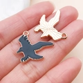 Pendentifs oiseaux en émail noir avec finition dorée pour la création de bijoux DIY - Corbeau (19543)