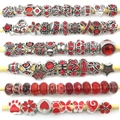 Macro shot of assorted red and silver charms with glass beads and crystal patterns - Pandora Style Beads / 40 Pcs Pack (Approx 70g) / Red