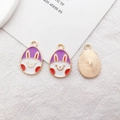 Easter bunny egg charm with purple enamel drip and gold metal finish details - Rabbit Egg