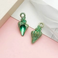 Green conch shell charm with gold trim for DIY earring and jewelry making - Ocean Conch (8599)