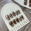 Brown cat eye press-on nails with amber rhinestones and glitter on a white display card - XS / 516-Crystal Cat Eye