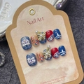 Handmade cat-eye press-on nails with lion dance charms and pearl pendants in red and blue - Extra Small (XS) / Lion Dance Peace & Joy