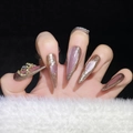 Uñas postizas stiletto con textura metálica de bronce y efecto de ojo de gato púrpura - XS / Rosa Dorado Ojo de Gato