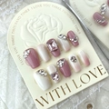 Uñas postizas degradadas rosa y crema con pedrería de lujo en piel blanca - Grande (L)