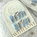Handmade press-on nails with light blue heart rhinestones and silver star accents - L / Sea Salt Starry