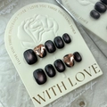Handmade black cat-eye press-on nails with champagne heart-shaped 3D rhinestones - Large (L)