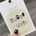 Japanese anime style black and white press-on nails with cow print and cat silhouette - Large (L)