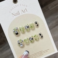 Handmade panda and bamboo nail press-ons on a professional collection display card - Large (L)