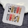 Extra lange kunstnagels met luipaard- en zebraprint in diverse patronen en glanzende finish - Groot (L) / Panterstijl