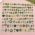 Colorful mixed DIY alloy charms in gold finish with various cute patterns on pink background - Mixed Style / Green Series