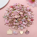 Assorted pink enamel charms including flowers, hearts, and animals for DIY jewelry making - Mixed Style / Pink Series